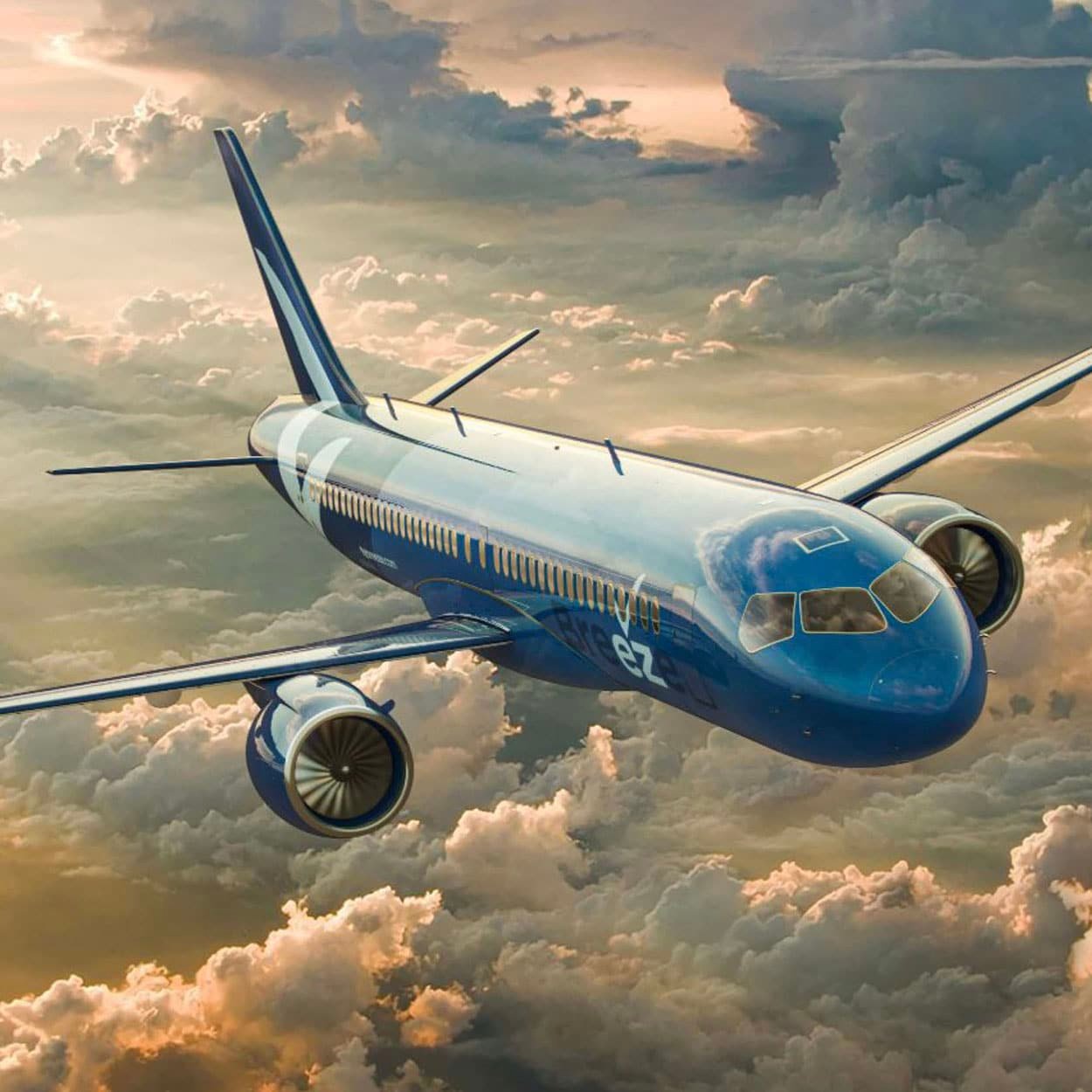 A blue commercial airplane is flying above the clouds during sunset, with a warm golden glow illuminating the sky. The airplane is in mid-flight, and its sleek design, twin engines, and visible winglets are prominent against the backdrop of dramatic clouds.