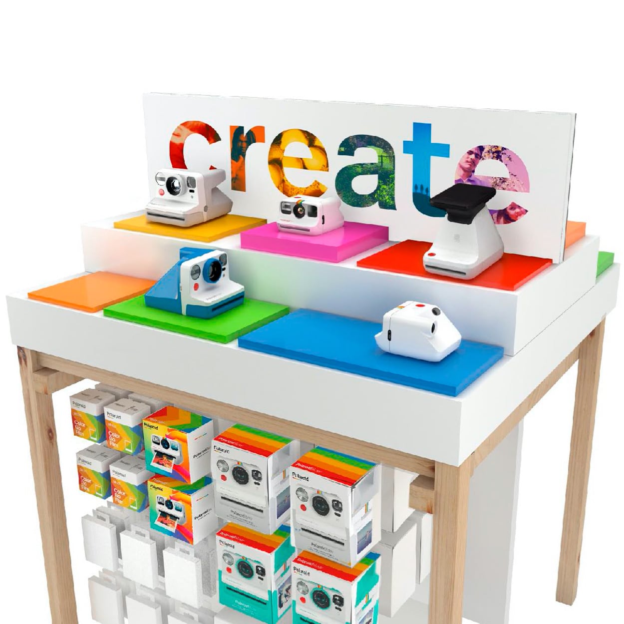 A display stand showcases colorful Polaroid instant cameras. The word "create" is prominently featured above the cameras in vibrant letters. Below the display, various camera accessories and boxes are neatly organized, celebrating the brand's rebirth with a bright, inviting design.
