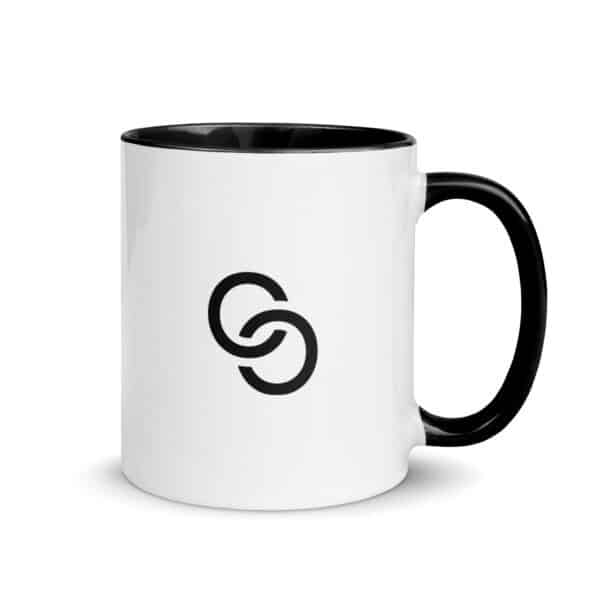 A white ceramic Mug with Color Inside, featuring a minimalistic black logo on the front consisting of two interlocking circles, this stylish mug with color inside is both sleek and functional.
