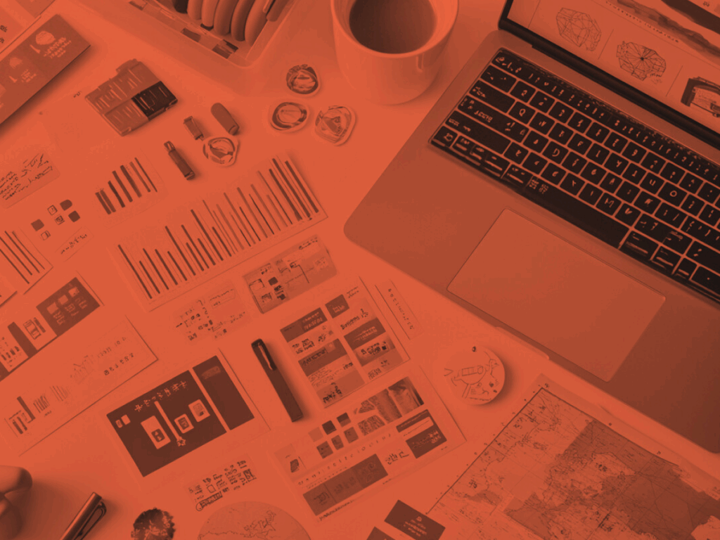 Flat lay of an international marketing strategy workspace featuring charts, graphs, multilingual branding mockups, a laptop displaying data, a map of Europe and Asia, colorful sticky notes, and planning tools—all tinted in a bold red overlay.