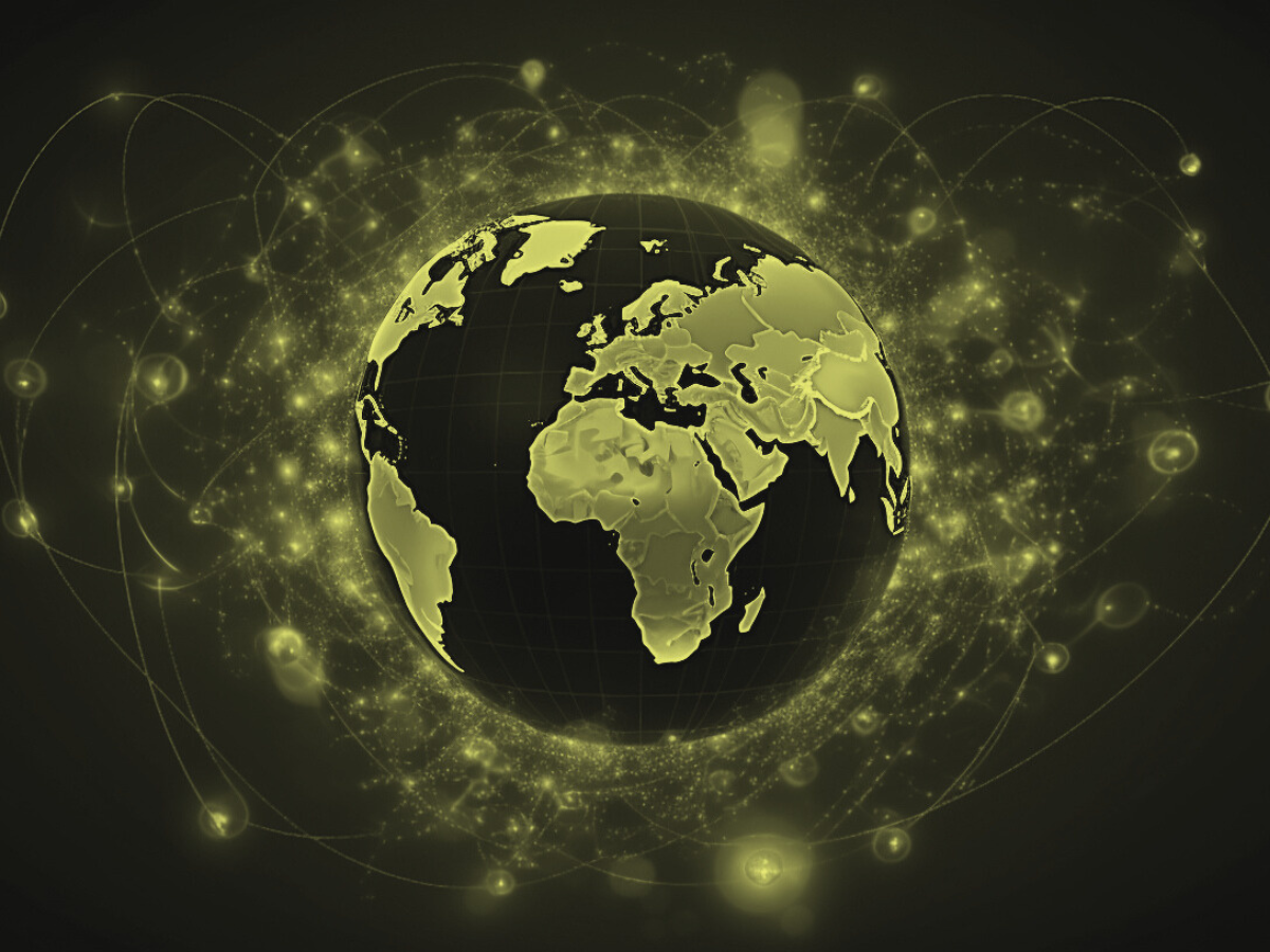 Stylized glowing globe surrounded by digital connection lines, symbolizing global business expansion and transformation.