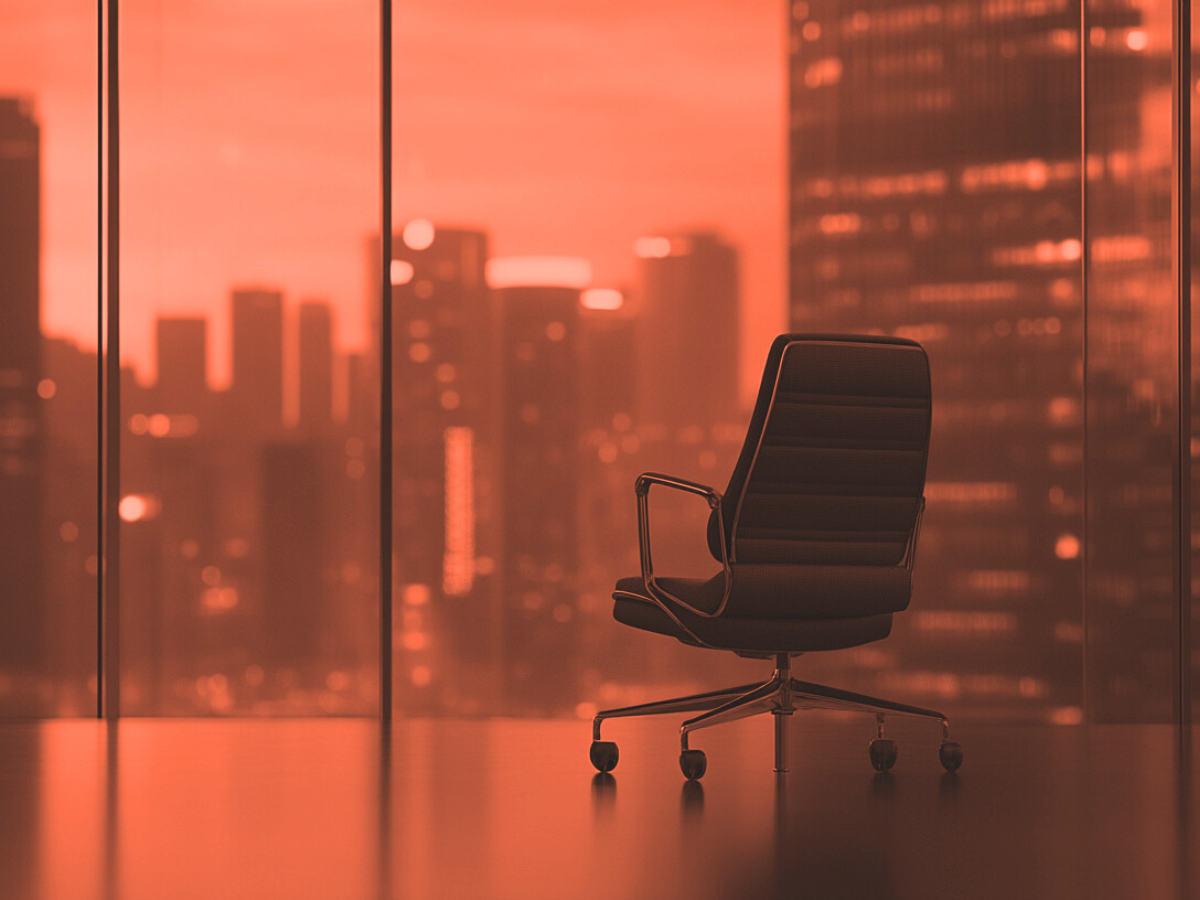 Empty executive chair in a modern office with city skyline view, symbolizing unfilled senior marketing leadership roles
